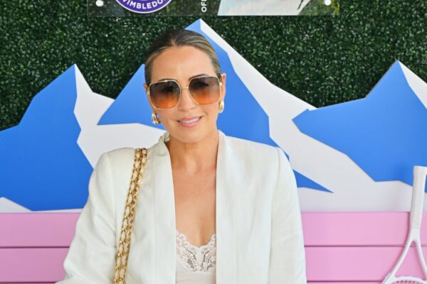 Rachel Stevens in big sunglasses and a white blazer