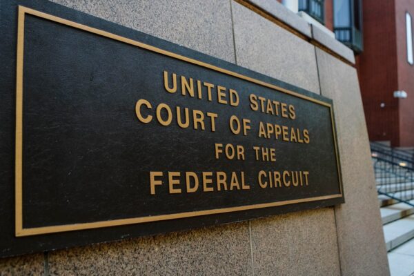 This lawsuit in court this week could throw a wrench in Trump's trade policy. Here's what to know.