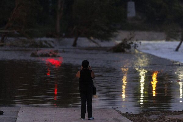 How much rain fell in Texas that caused the catastrophic flooding?