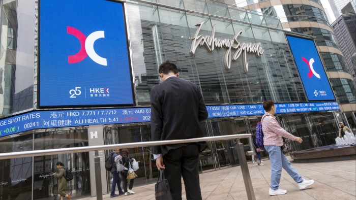 The logo for Hong Kong Exchanges and Clearing Ltd displayed on a screen at the Exchange Square complex in Hong Kong