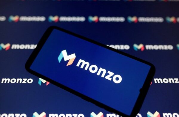 A smartphone displays a Monzo logo