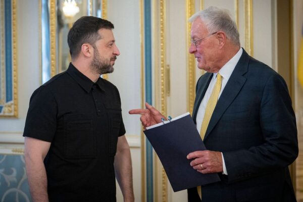 Ukrainian President Volodymyr Zelenskyy, left, and United States special envoy for Ukraine and Russia Joseph Keith Kellogg talk in Kyiv, Ukraine, Monday, July 14, 2025. (Ukrainian Presidential Press Office via AP)