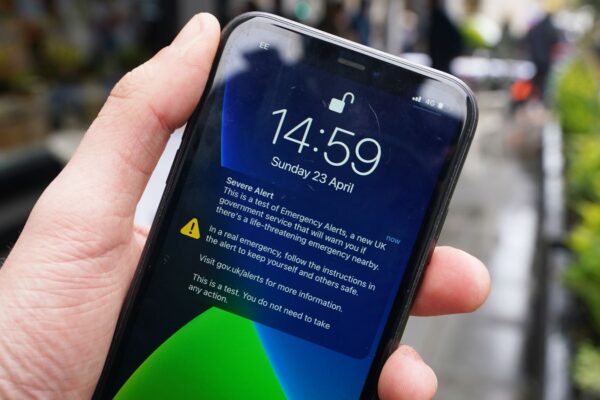 A test of a new public alert system on a mobile phone on Regent Street in London. Picture date: Sunday April 23, 2023.