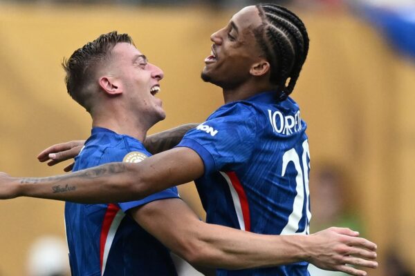 Liam Delap and Joao Pedro celebrate after Chelsea's Club World Cup win