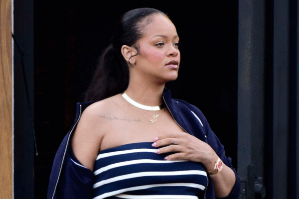 Rihanna brought back the tube top with a khaki Miu Miu skirt and Puma sneakers.
