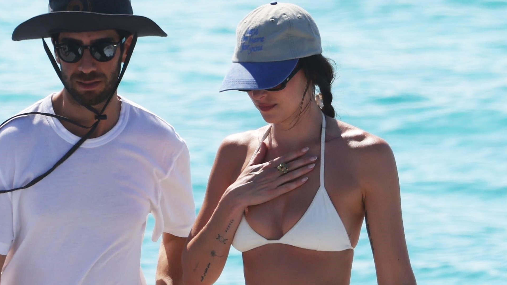 Dakota Johnson Sails to Ibiza in a Bikini, Dôen Skirt, and Gucci Bag
