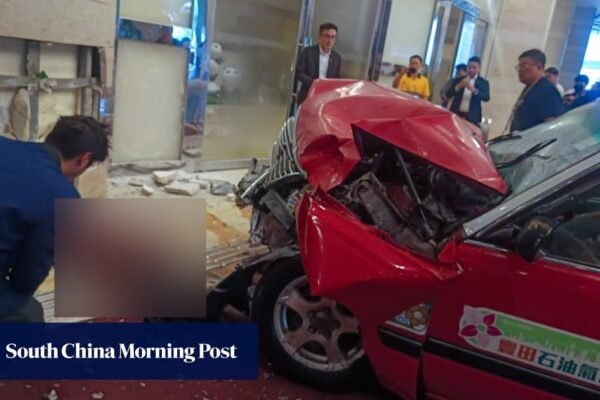 Tourist dies after Hong Kong cab crashes into hotel taxi rank