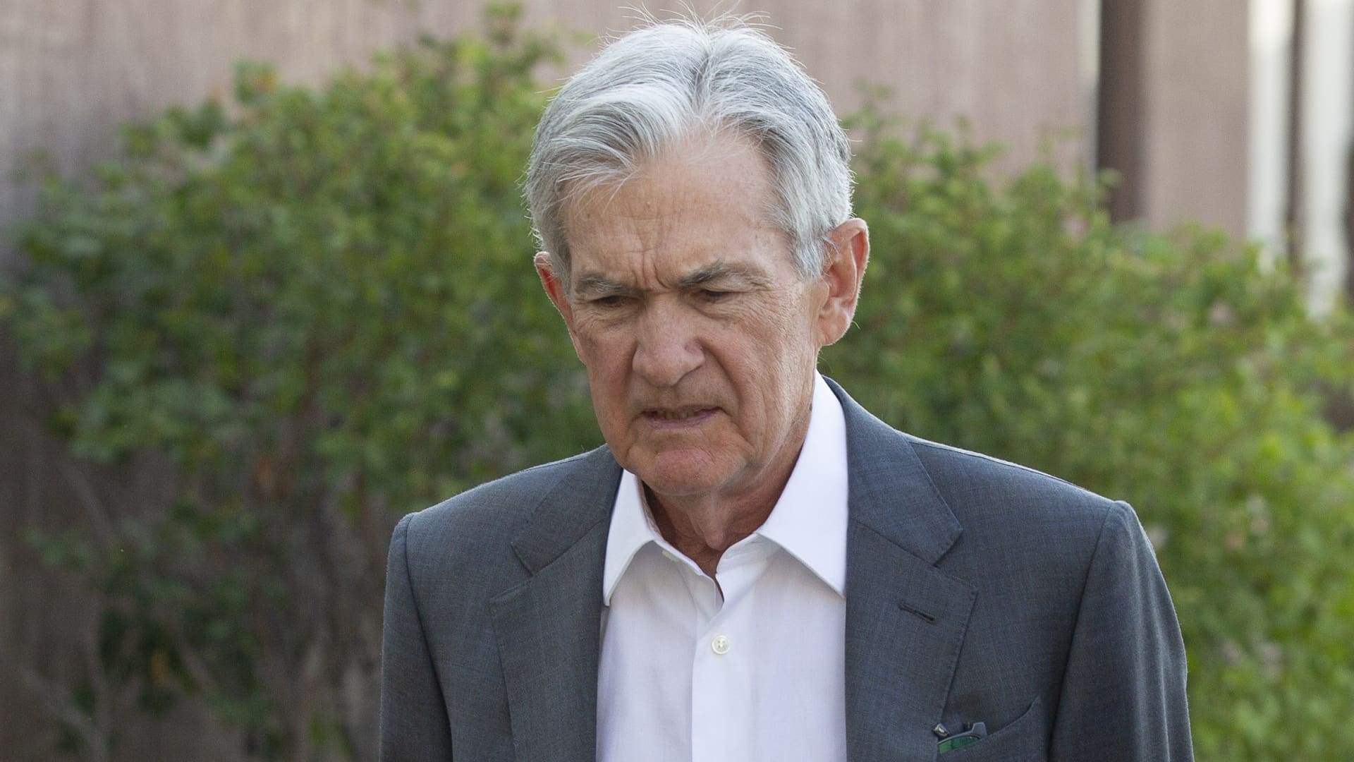 Powell indicates conditions 'may warrant' interest rate cuts as Fed proceeds 'carefully'