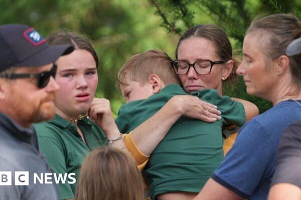 Minneapolis school attacker 'obsessed with idea of killing children', officials say