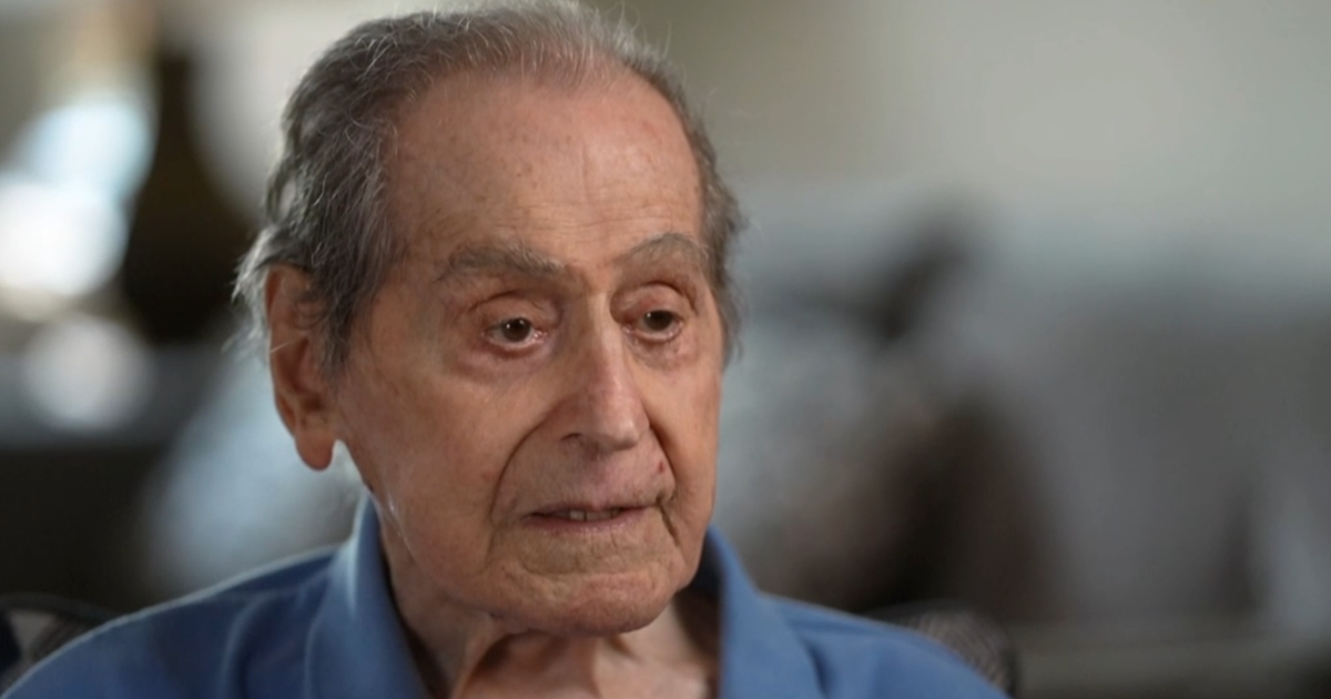 Decades ago, a WWII veteran signed a contract to conduct a band on his 100th birthday. Last month, he fulfilled it.