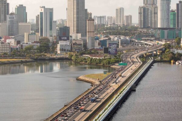 No plans to 'fully liberalise' cross-border ride hailing, but app bookings for licensed taxis being considered: LTA