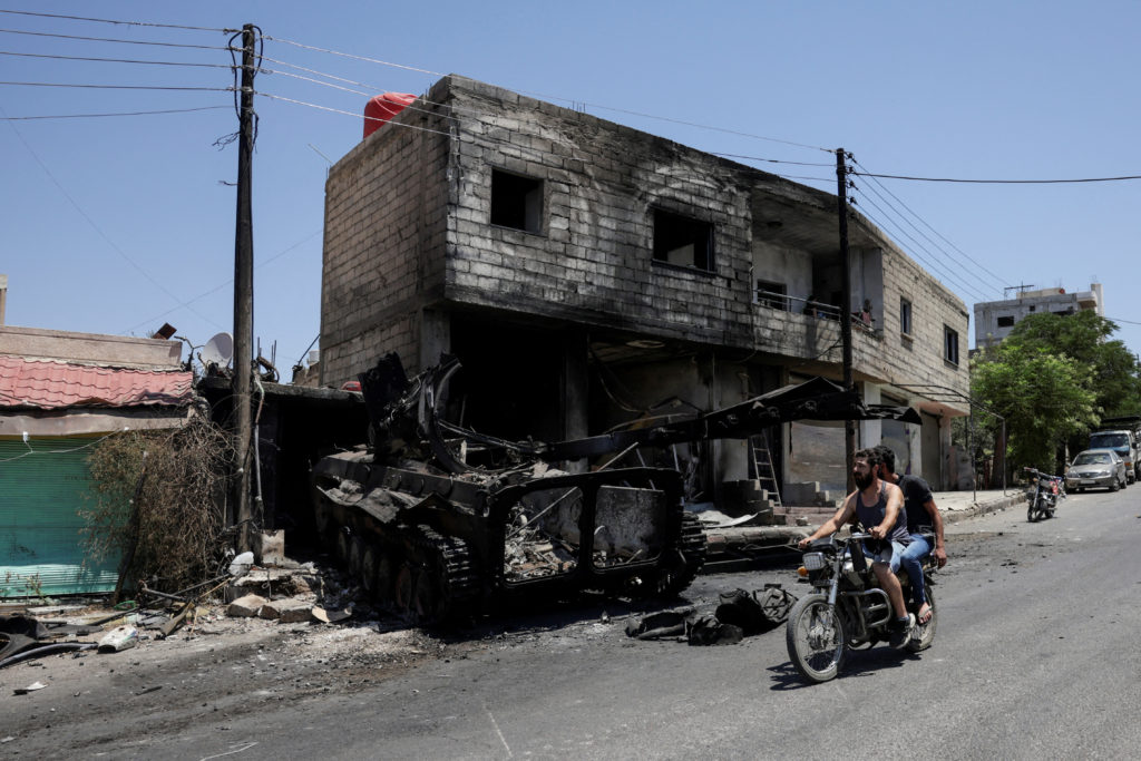 FILE PHOTO: Aftermath of deadly clashes between Druze fighters, Sunni Bedouin tribes and government forces, in Sweida