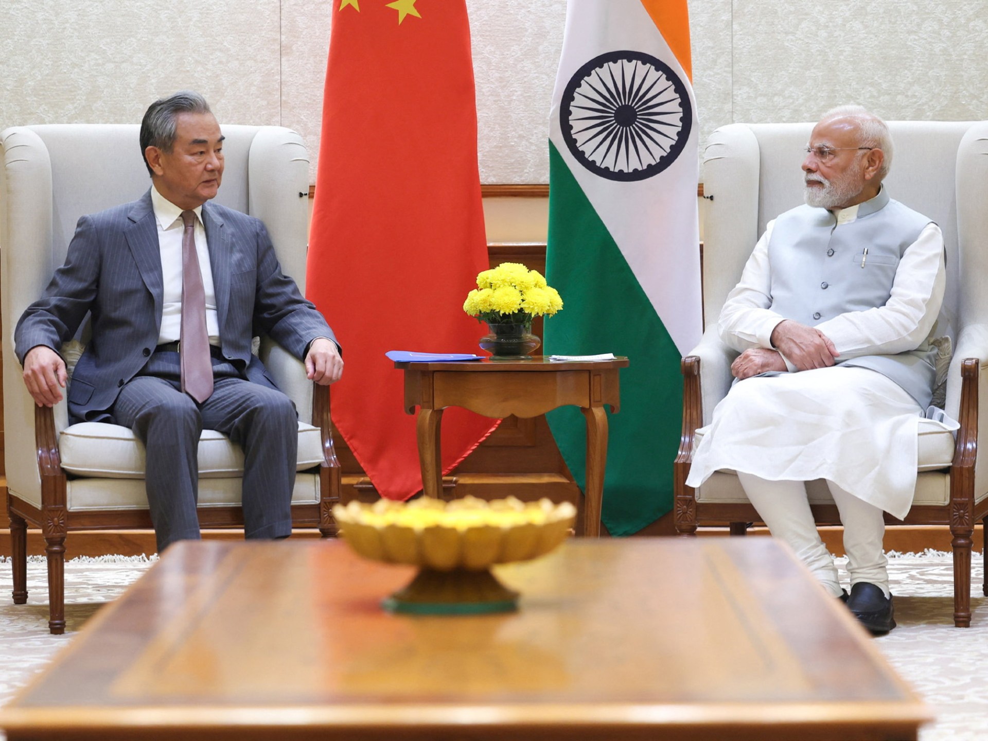 India’s Modi meets China’s top diplomat Wang as Asian powers rebuild ties | News