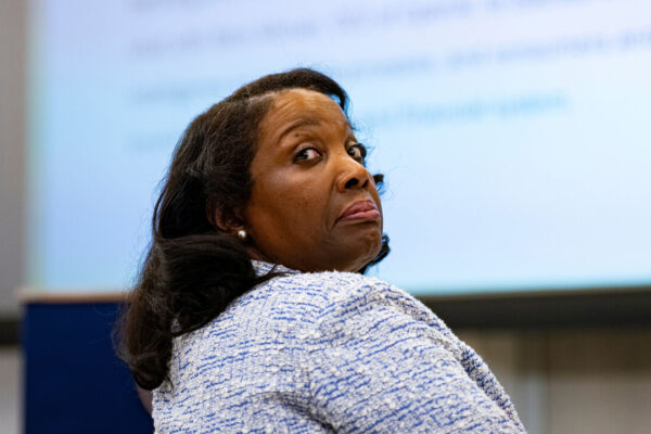 Lisa Cook, governor of the US Federal Reserve, looks back over her right shoulder - during the Federal Reserve Integrated Review of the Capital Framework for Large Banks Conference in Washington, DC, USA.