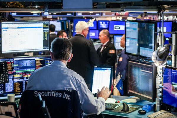 Wall Street ends down as traders focus on Nvidia, Fed after last week's rally