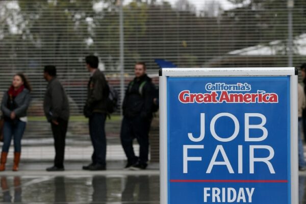 Asian markets fluctuate as traders weigh tariffs, US jobs