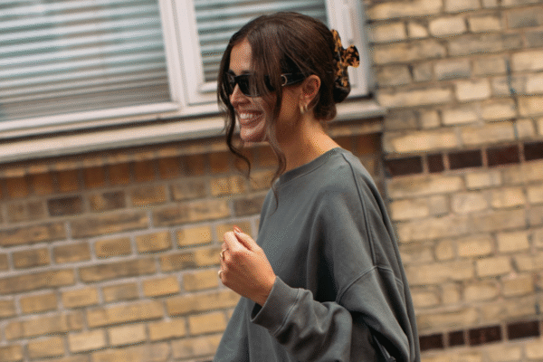 Woman wearing a gray sweater