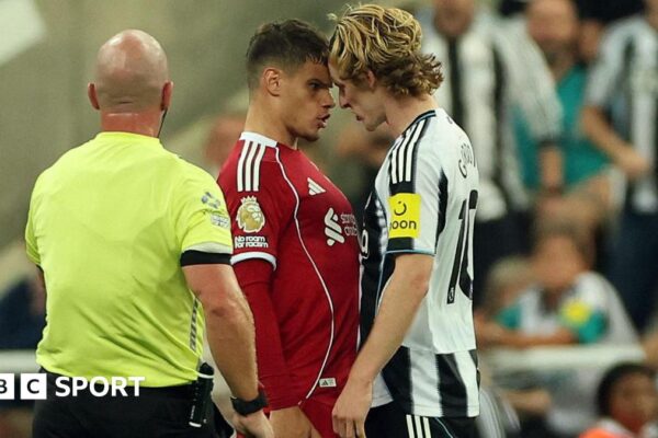 Newcastle's Anthony Gordon, who was sent of for a foul on Virgil van Dijk, squares up to Liverpool's Milos Kerkez