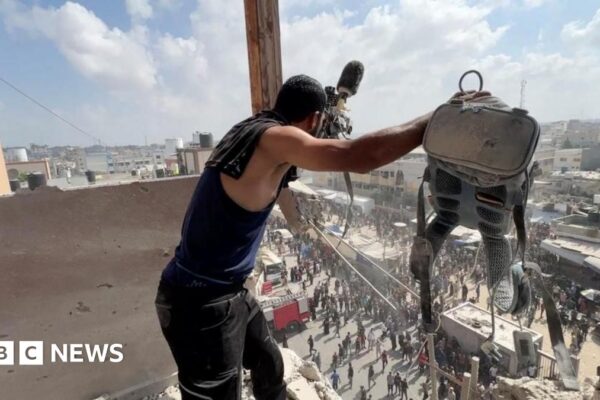 Five journalists among 20 killed in Israeli strike on hospital, Gaza officials say - latest