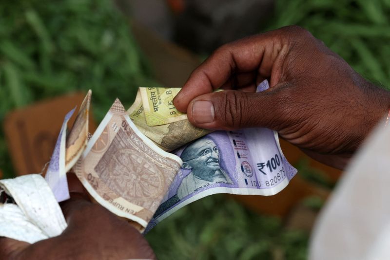 Rupee to rise at open on NDF lift; U.S. tariffs, inflation on radar