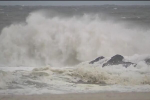 Watch the waves and the storm from the Asbury Park boardwalk