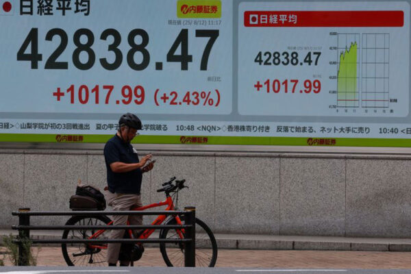 Japan's Nikkei rallies to record high, SoftBank surges