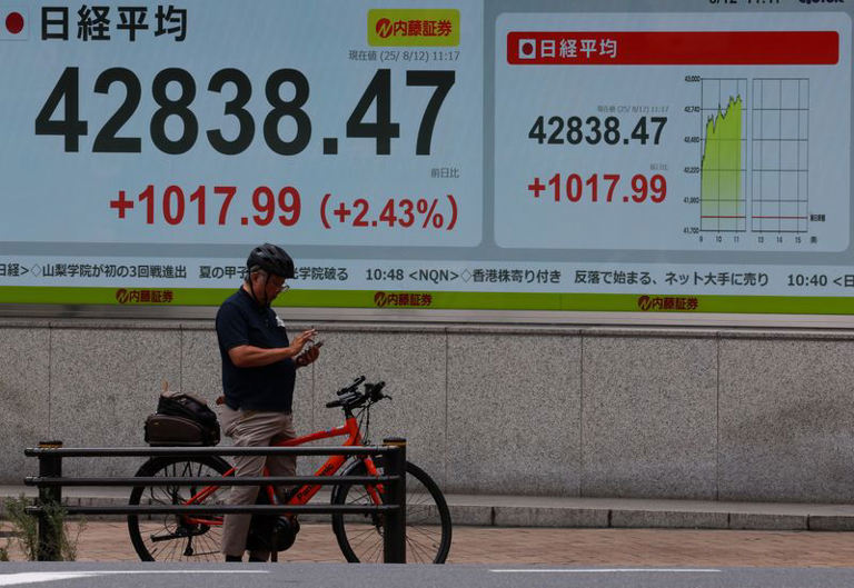 Japan's Nikkei rallies to record high, SoftBank surges