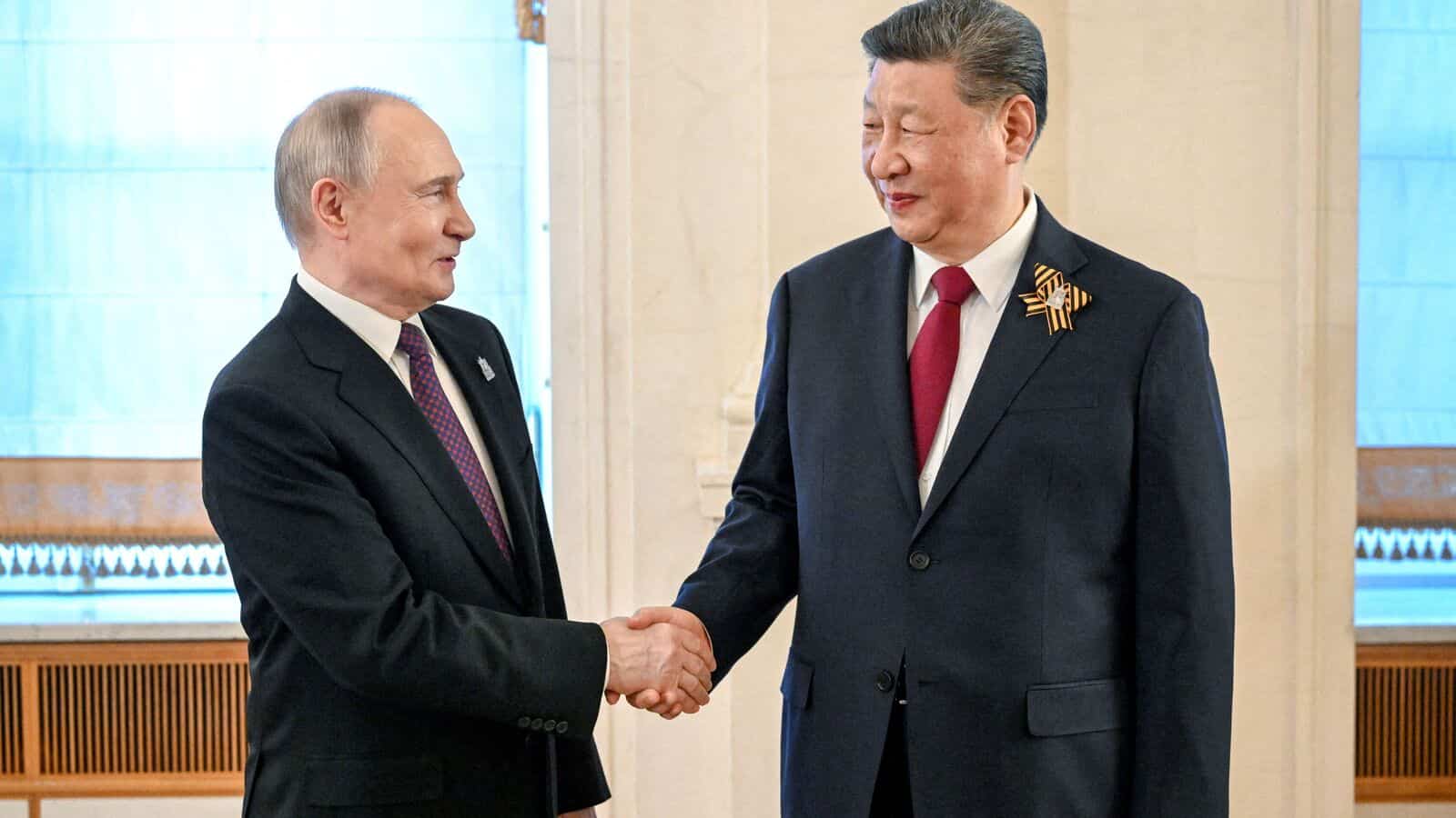 Russian President Vladimir Putin with Chinese President Xi Jinping.