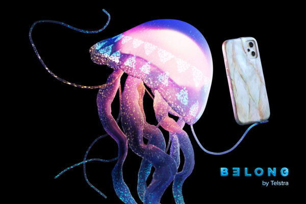 Belong marketing image which shows jellyfish holding a smartphone alongside Belong logo