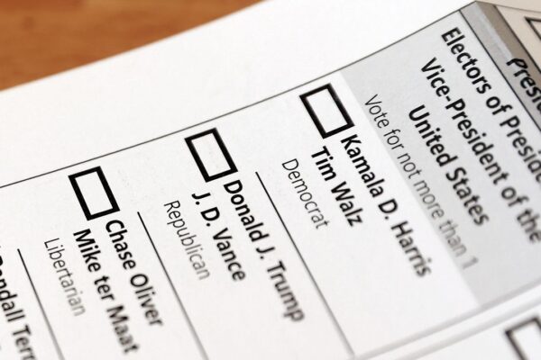 An official absentee mail-in ballot is ready to be marked for the 2024 US Presidential election. (Photo by Amy Lemus/NurPhoto via Getty Images)