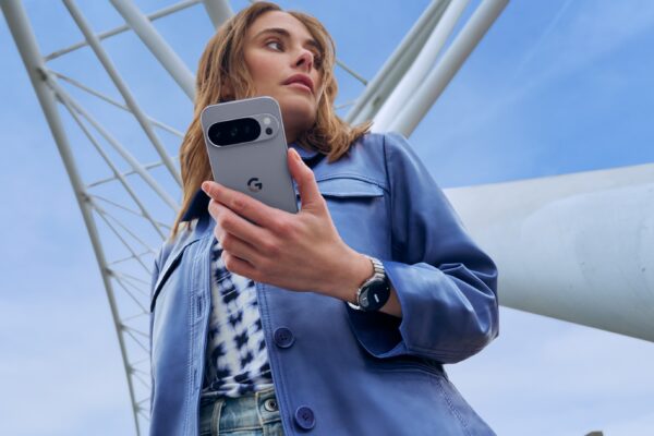 an image of a woman holding the Google Pixel 10 Pro