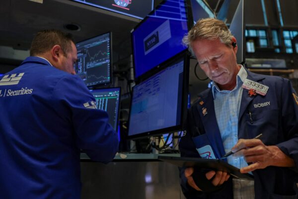 Wall Street ends flat, but S&P hits another closing high as rate-cut bets waver