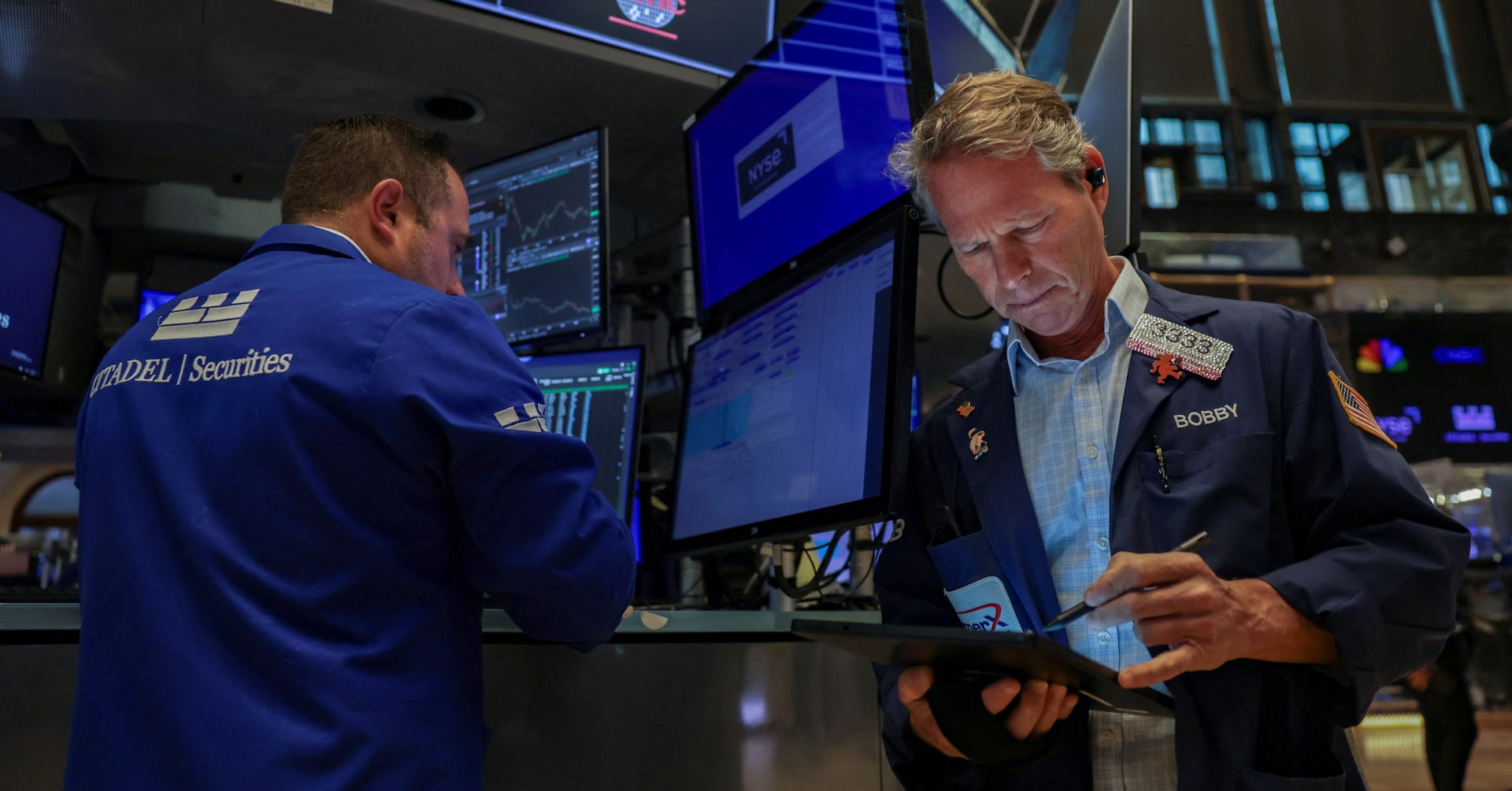 Wall Street ends flat, but S&P hits another closing high as rate-cut bets waver