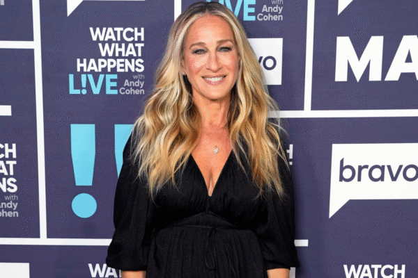 Sarah Jessica Parker wearing black empire line dress