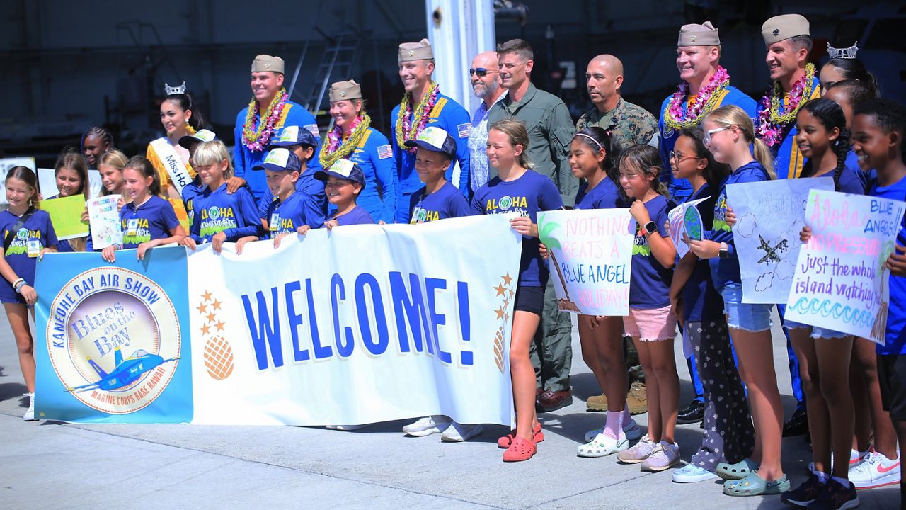 A group of 21 student ambassadors from Mokapu Elementary School greeted the pilots upon their arrival at Kaneohe Marine Corps Base Hawaii. (Spectrum News/Brian McInnis)