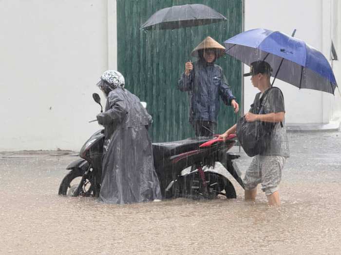 Heavy rain falls in parts of Southeast Asia after tropical storm blows into Vietnam
