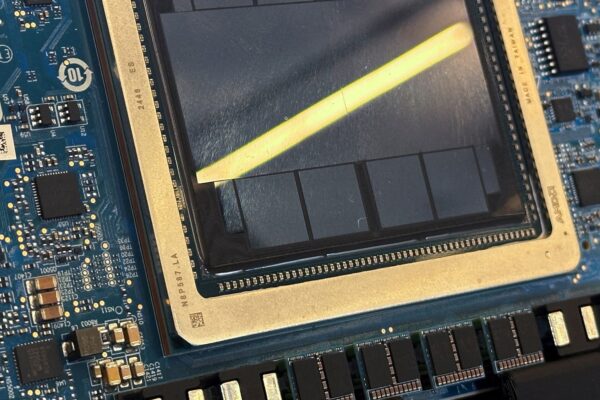 Wall St mixed, chip majors in focus after China sales deal