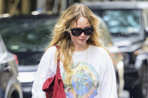 Jennifer Lawrence rewore her summer outfit formula, white lacy pants with The Row sandals