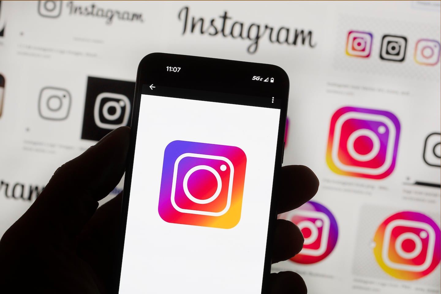 The Instagram logo is seen on a cell phone in Boston, Oct. 14, 2022.