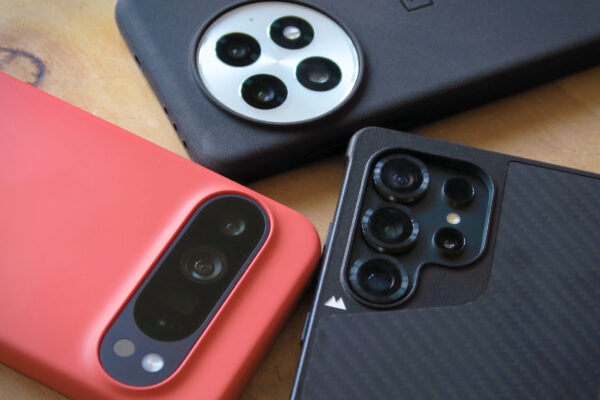 The Google Pixel 9 Pro XL in the Coral Mous case, the OnePlus 13 in its magnetic case and the Samsung Galaxy S25 Ultra in a Mous Limitless case