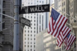 Stocks Settle Lower as Bond Yields Rise on Hawkish Fed Comments