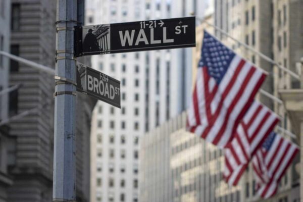 Stocks Settle Lower as Bond Yields Rise on Hawkish Fed Comments