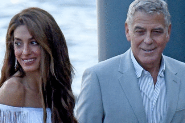 Amal Clooney arrived in Lake Como wearing a fringed white dress