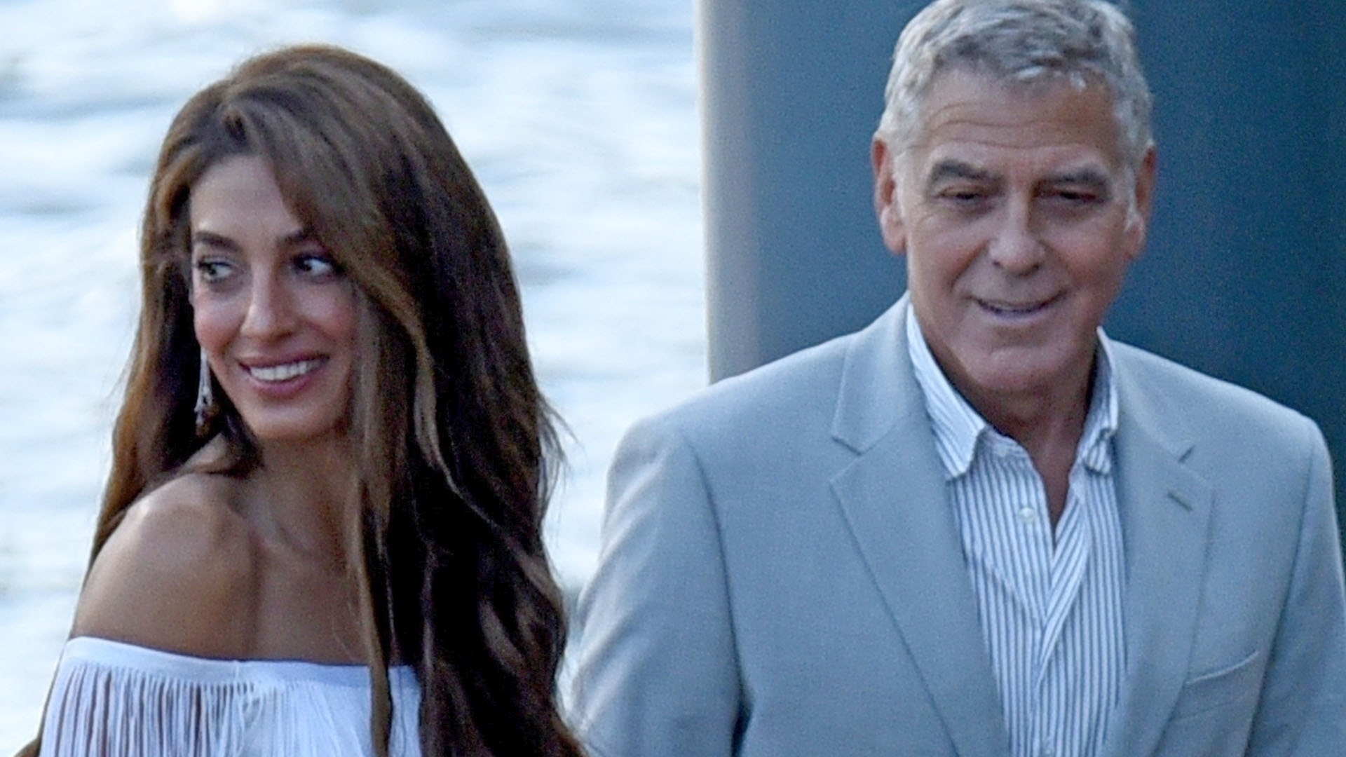 Amal Clooney arrived in Lake Como wearing a fringed white dress