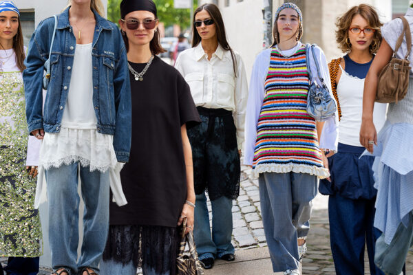 How to Wear Skirts and Dresses Over Jeans This Fall