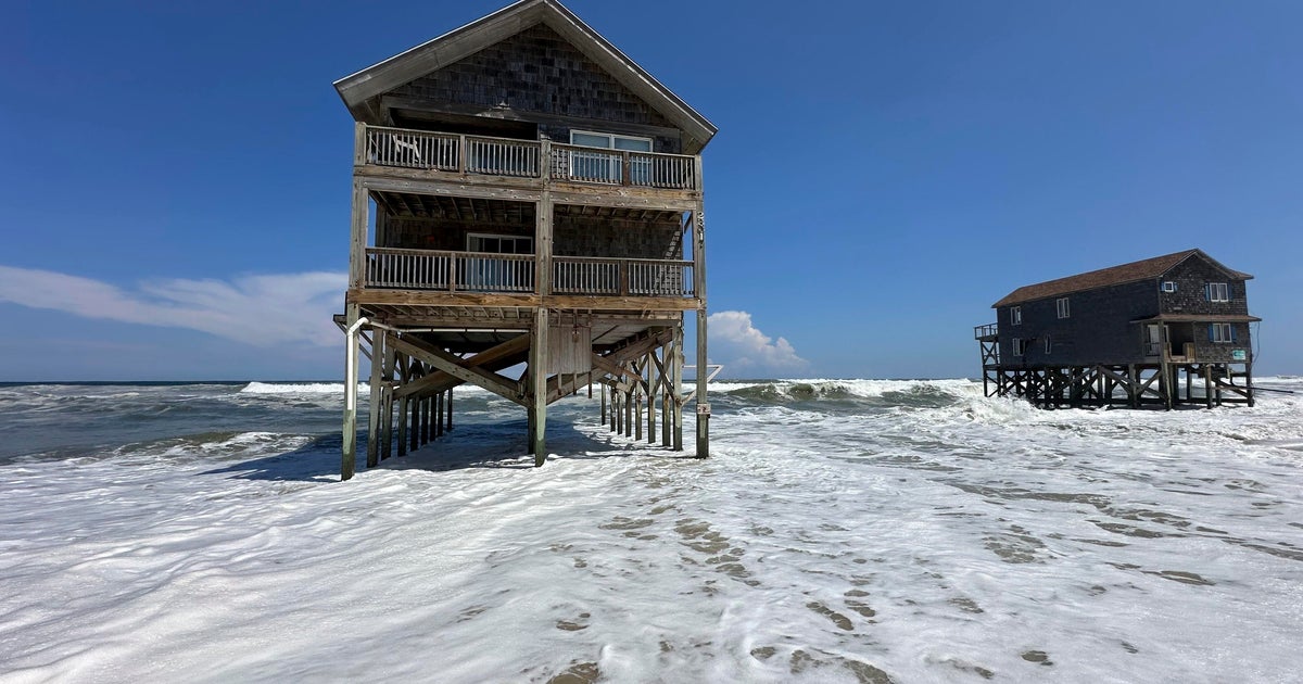 Photos show Outer Banks homes appearing near collapse in Hurricane Erin's high waves