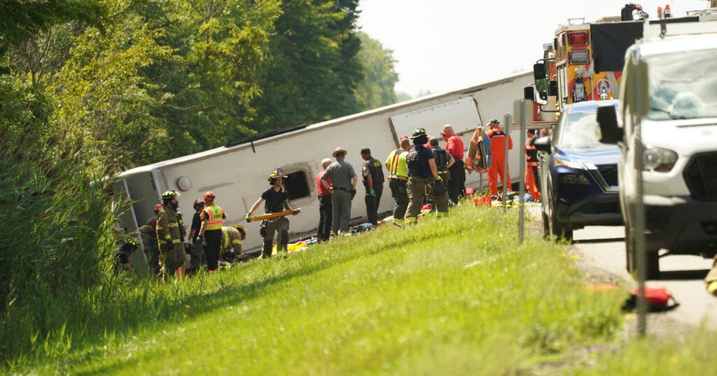 Tour bus rolls over on western New York highway, killing 5 people, police say
