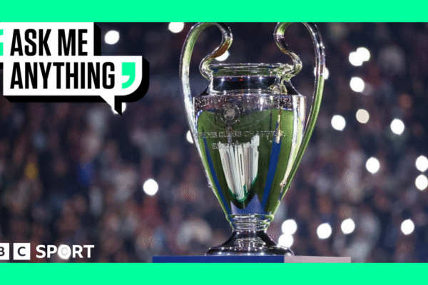 General view of the Champions League trophy with green Ask Me Anything graphic banner surround