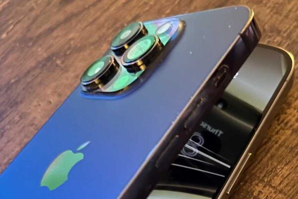 An image with two iPhones made to look like they're folding
