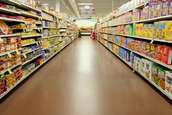 Americans could soon face higher inflation as businesses pass along tariff costs, Fed official says